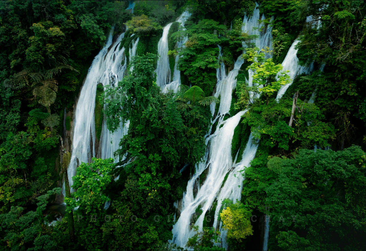 Trekking Through the Clouds to Nậm Lúc Waterfall